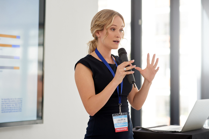 Businesswoman presenting innovation strategy – National Innovation Visa Subclass 858 Global Talent program Australia